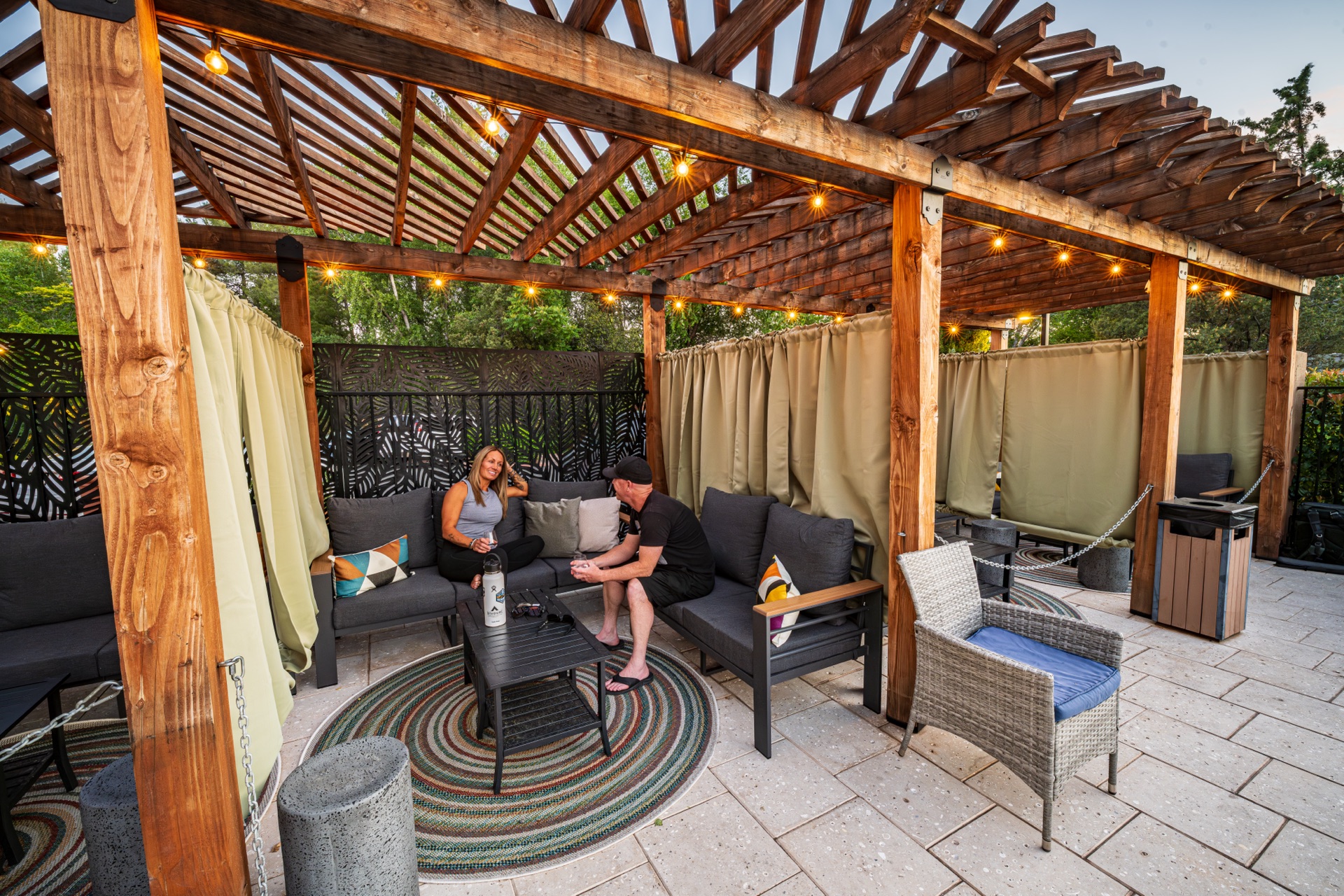 Poolside cabanas at Arroyo Pinion Hotel with pergola loungers