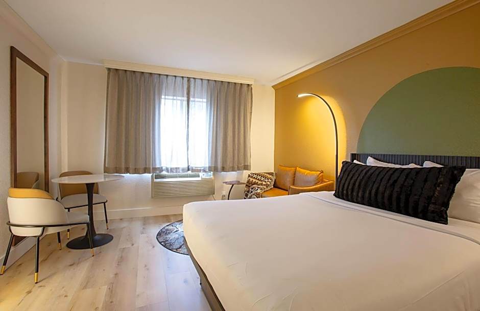 Room with Two Queen Beds and Sofa