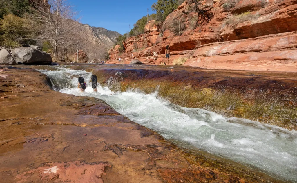 Scenic red rocks with flowing water near Arroyo Pinion Boutique Hotel Sedona