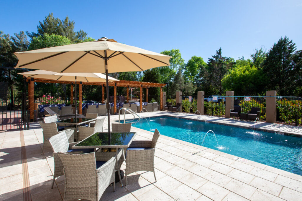 Comfortable outdoor seating area with nature views at Arroyo Pinion Hotel