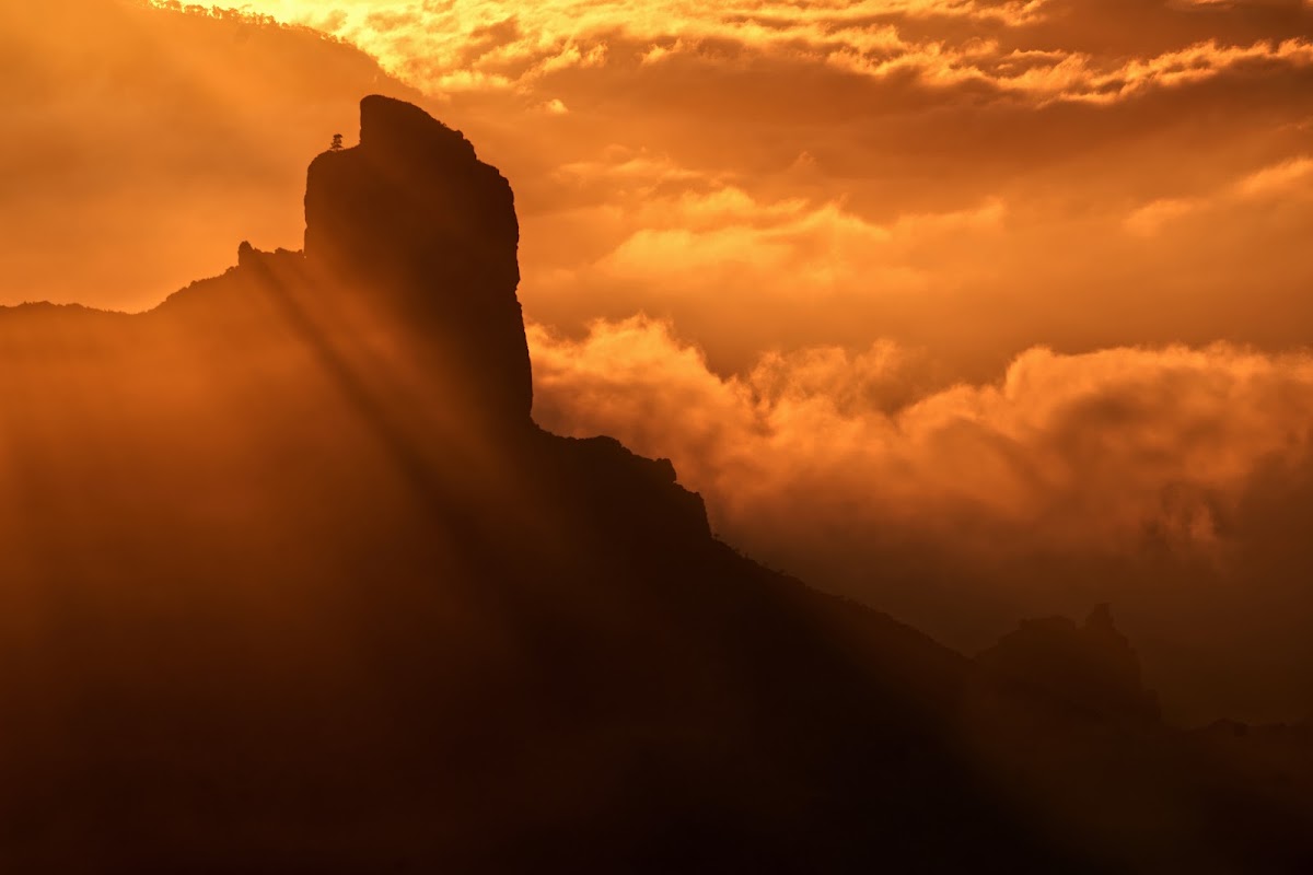 Dramatic monsoon sunset silhouetting Sedona's red rocks